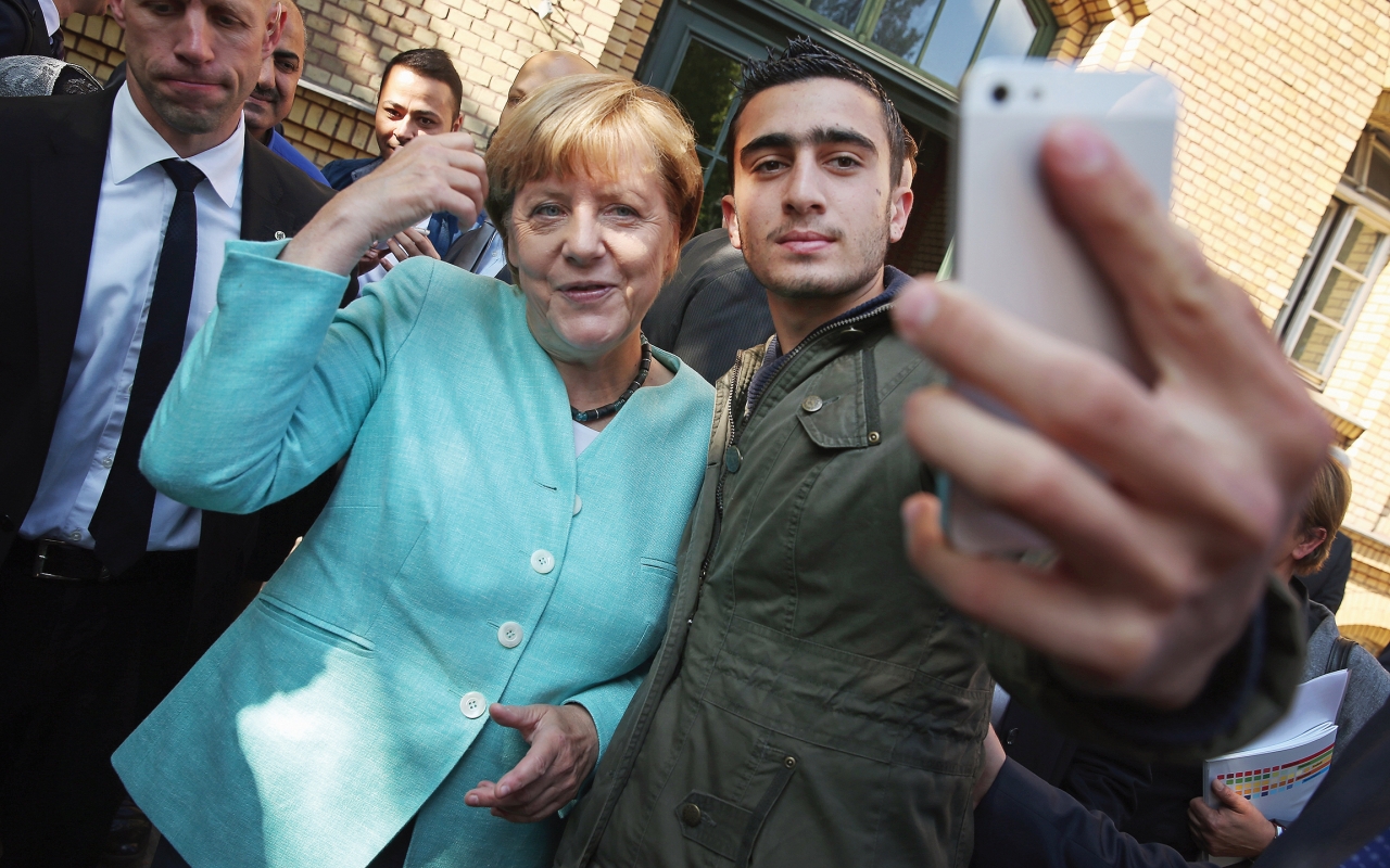 Germany In The Refugee Crisis Background Reactions And